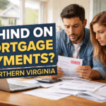 Couple reviewing overdue mortgage bills at a kitchen table while discussing home-selling options in Northern Virginia