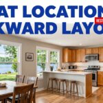 Reston lake-area townhome interior with a back kitchen, open living space, and large windows near a wooded lake community.