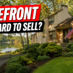 Lakefront home in Reston Virginia near mature trees and walking trails with water views.