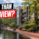 Lake Anne condo building in Reston Virginia near water, walking paths, and mature trees.