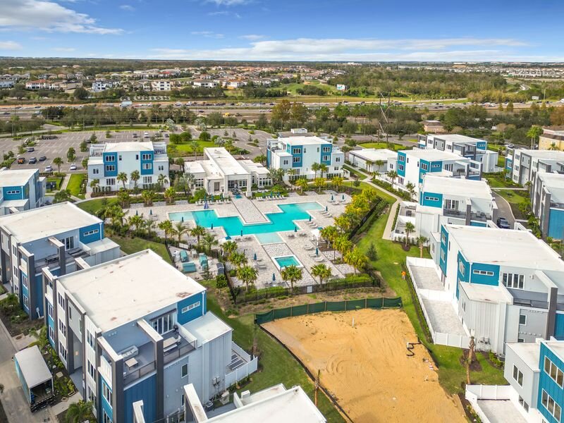 Modern vacation condos and large resort pool at Reunion Resort near Disney World