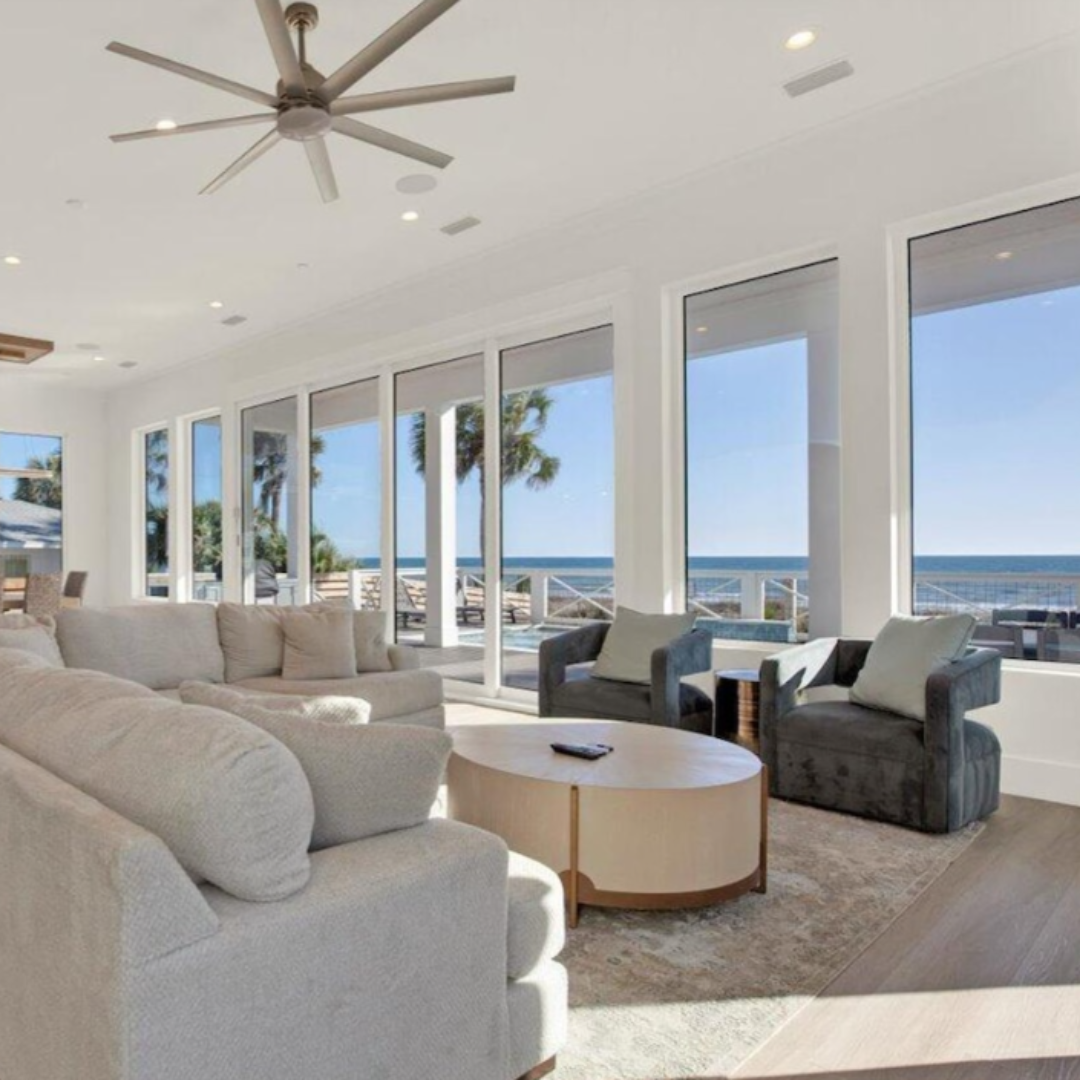 Spacious beachfront living room with ocean view
