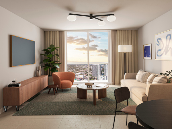Modern living room in The Crosby Miami luxury vacation rental with city views.