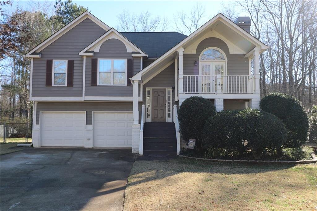 Two-story gray and white house in Marietta, Georgia. 