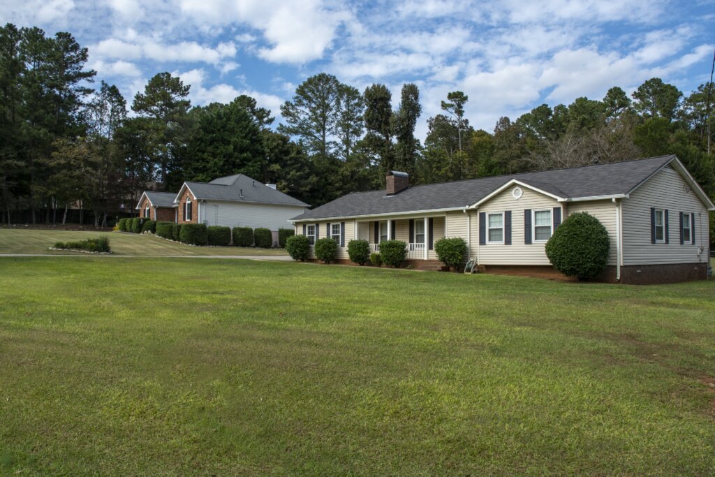 Two single-level homes with spacious yards located in Floyd County, GA.