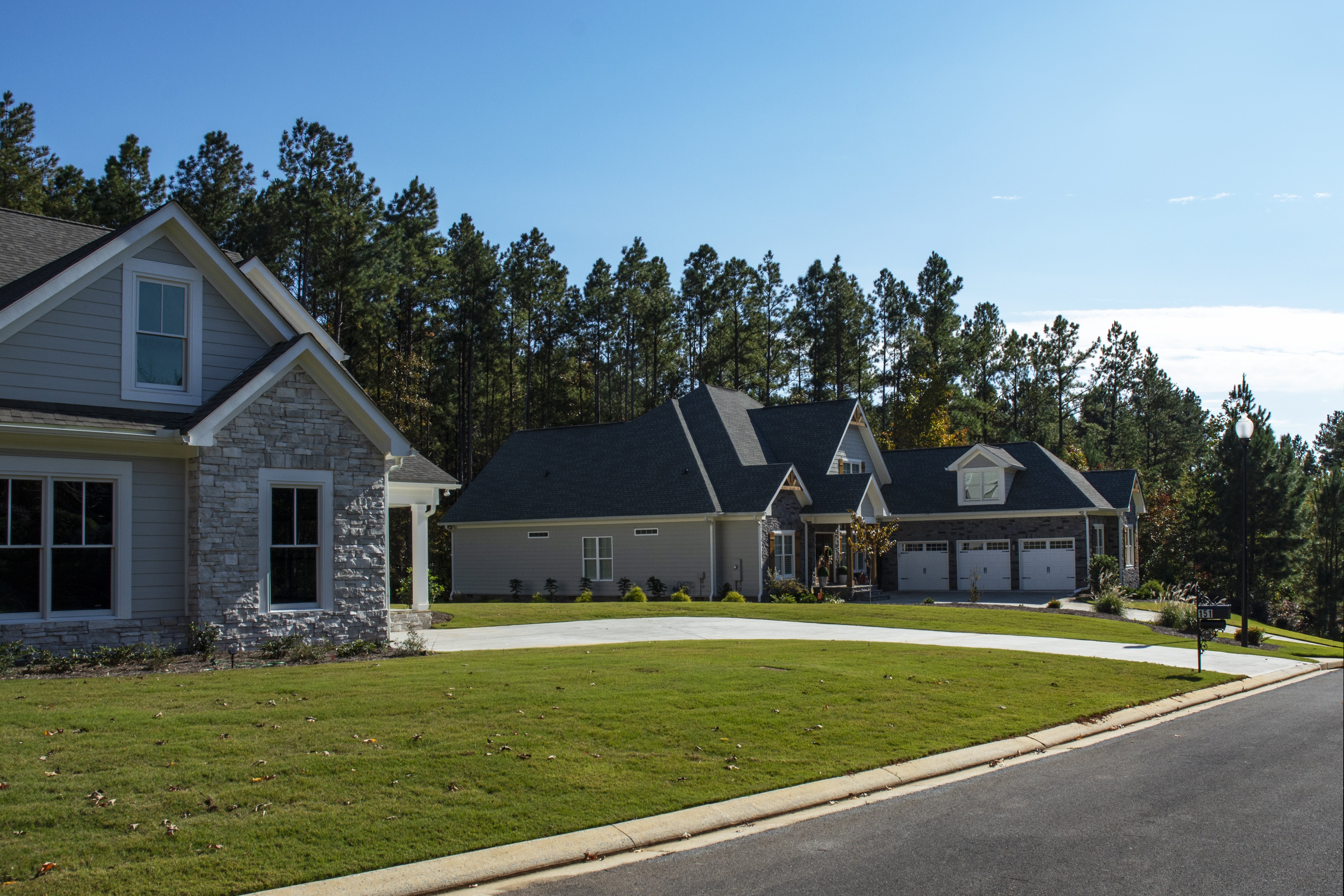 Newly constructed neighborhood featuring beautiful, modern homes with well-maintained exteriors and appealing curb appeal.