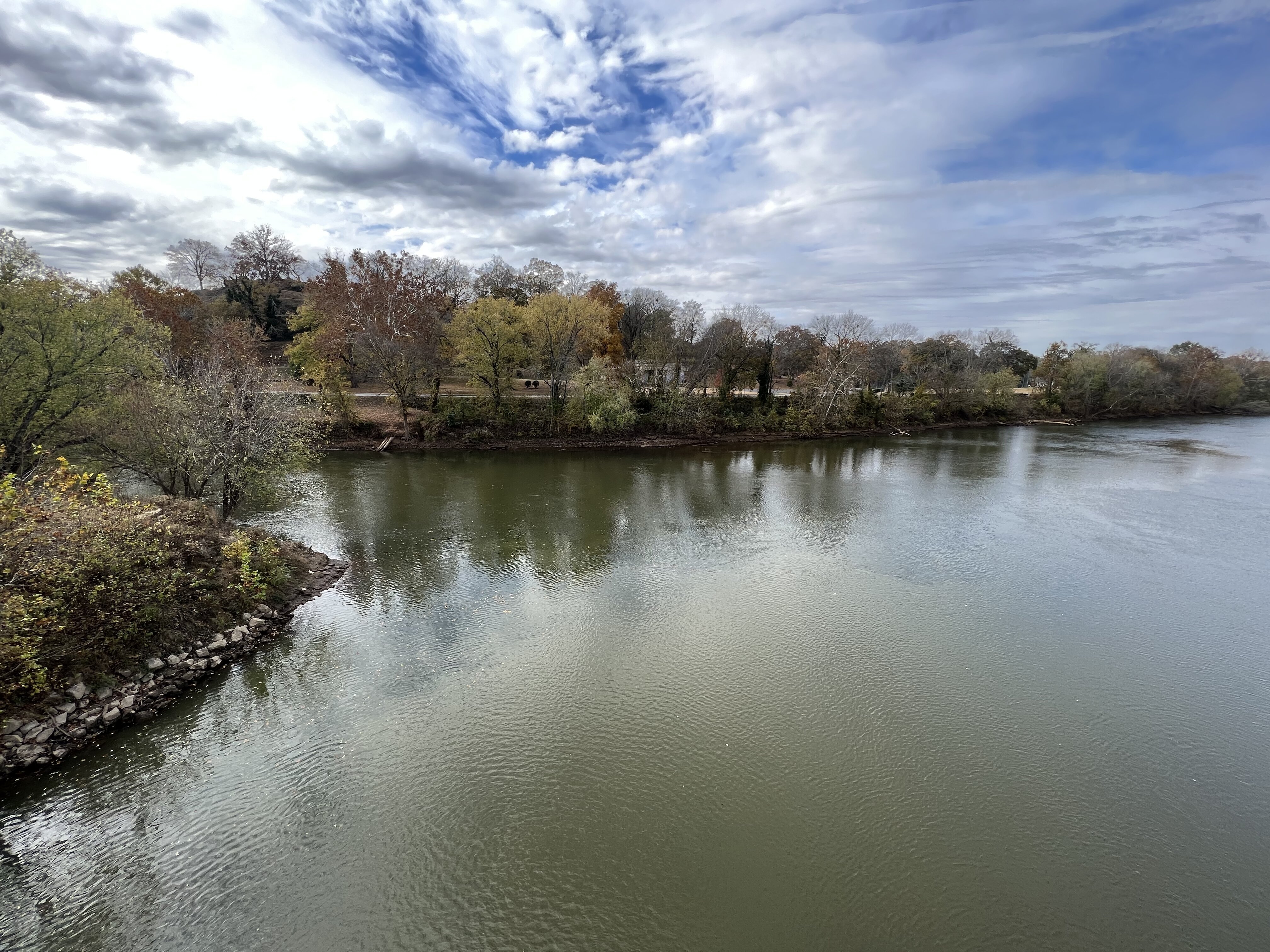 Coosa River flowing through downtown Rome, GA, offering scenic views and adding to the area's charm.