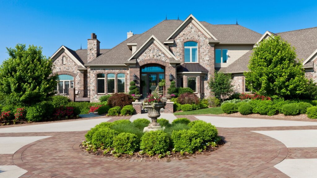 Elegant luxury home exterior with modern design, high-end finishes, and extensive curb appeal.