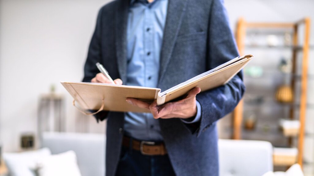 Realtor completing a home appraisal