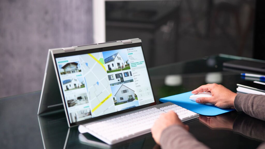 Person browsing real estate listings on their computer