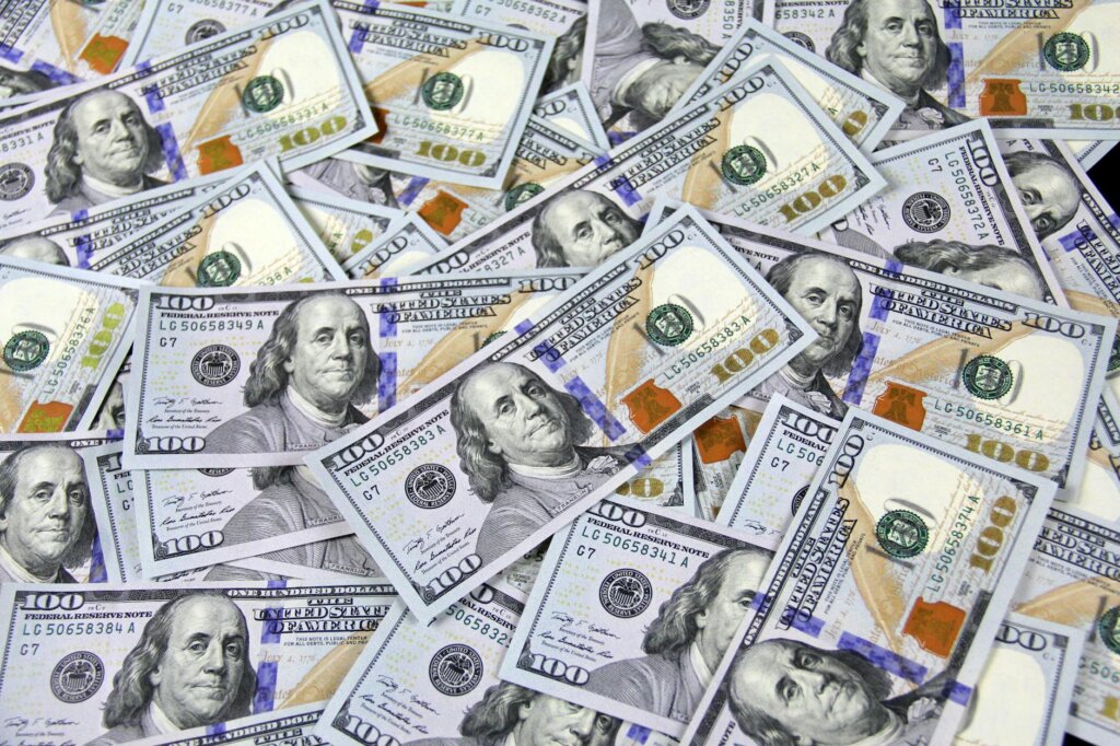 A large pile of cash for selling a promissory note