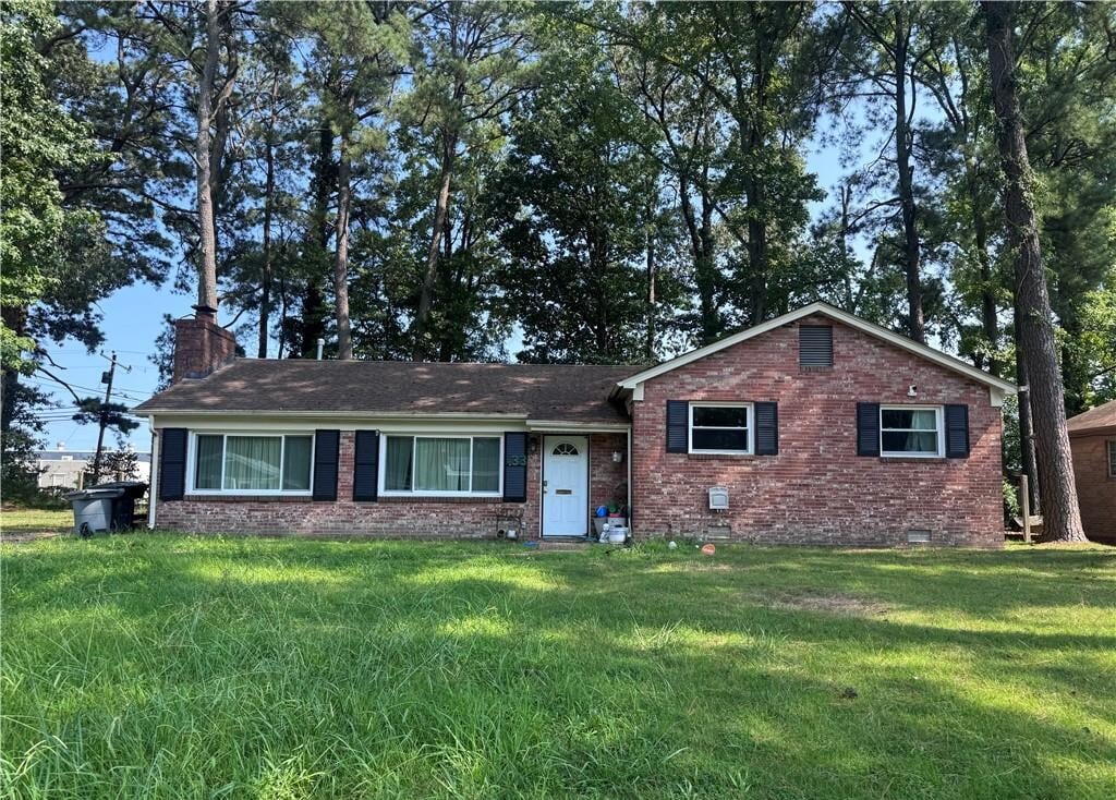 Brick ranch house on Azalea Drive in Hampton, VA that O’Neill Home Buyers bought from heirs before foreclosure