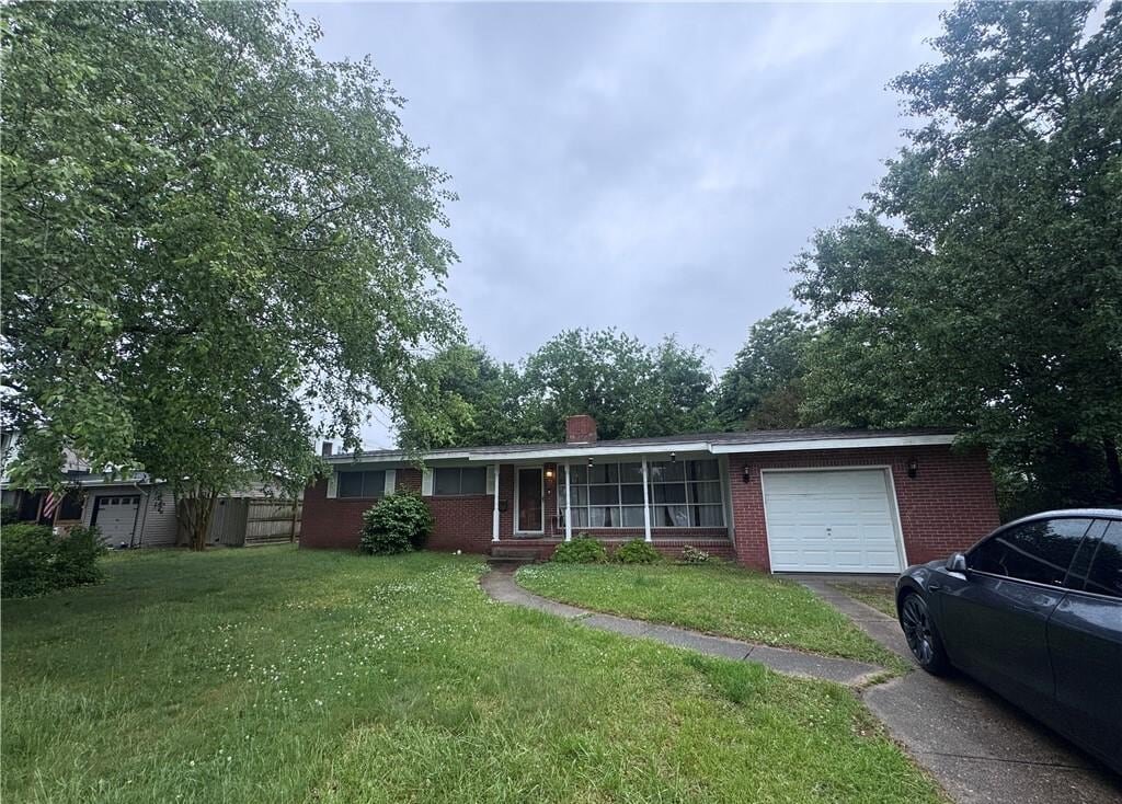 Brick ranch rental house on Caren Drive in Virginia Beach that O’Neill Home Buyers bought as-is from out-of-state owners