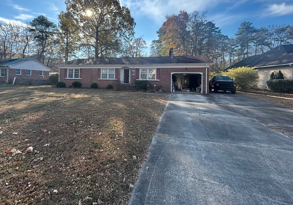 Brick ranch on Woodland Drive in Chesapeake, VA that O’Neill Home Buyers bought from the heir