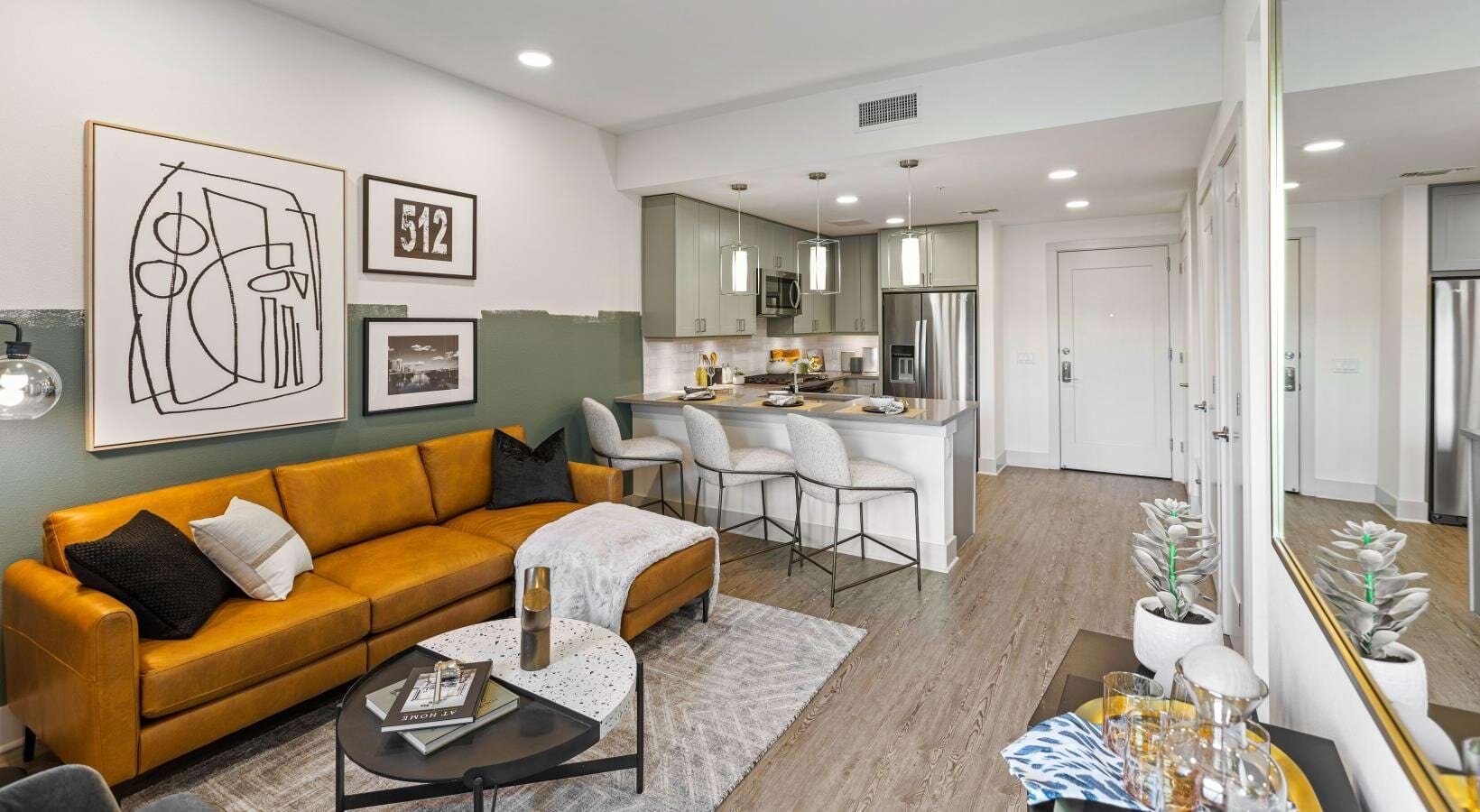 Avenir model unit — living area and open kitchen