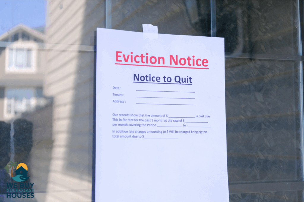 Eviction Notice to Quit taped to a window in Florida, illustrating the legal first step landlords must take to evict a tenant without a lease in 2025.