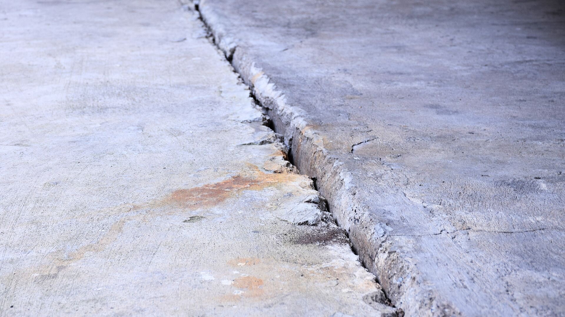 Cracked concrete floor.