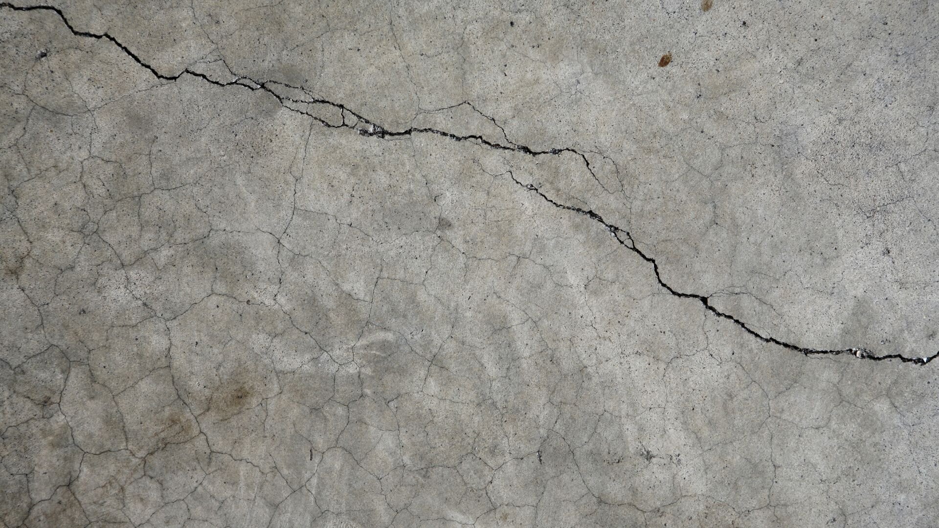 Cracked concrete floor.