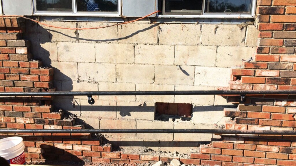 Foundation repair work underway at a residential property in Cambridge MA