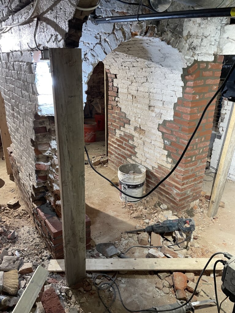 Close-up of a foundation repair in progress.
