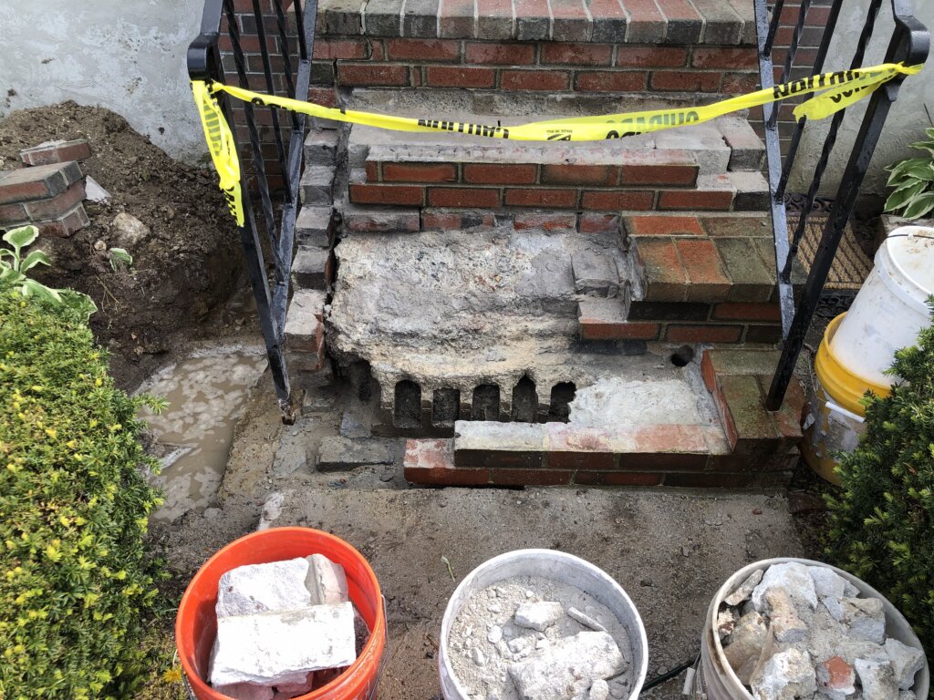 Brick steps in front of a house in Boston, MA.