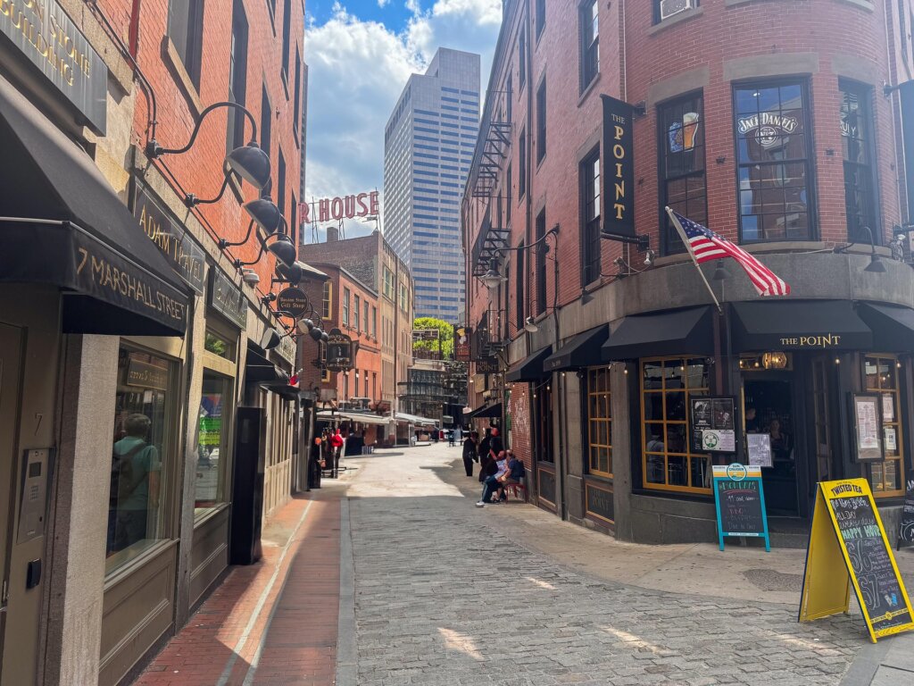 Street lined with shops in Boston, MA.