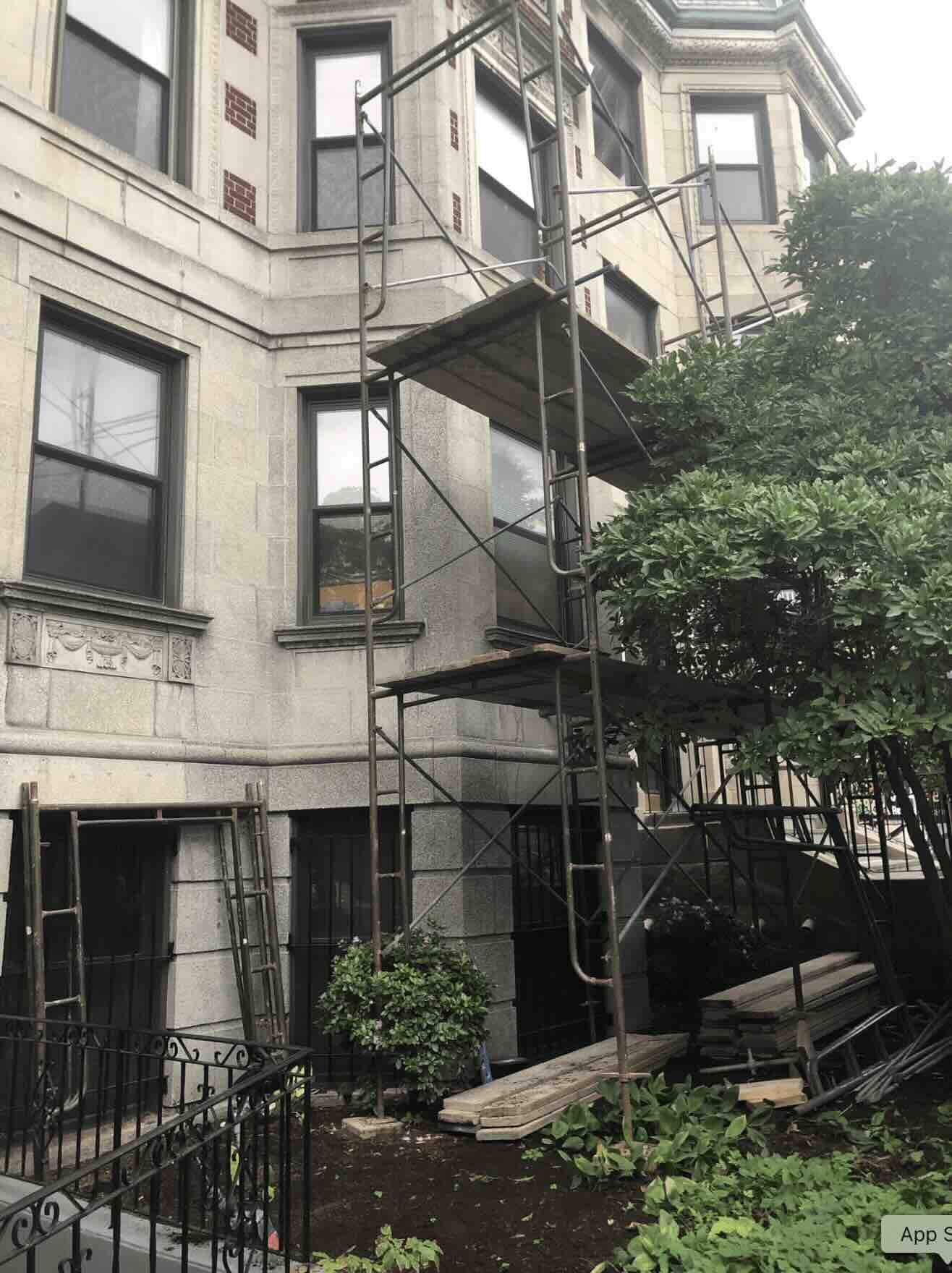 Building with scaffolding in Cambridge, MA.