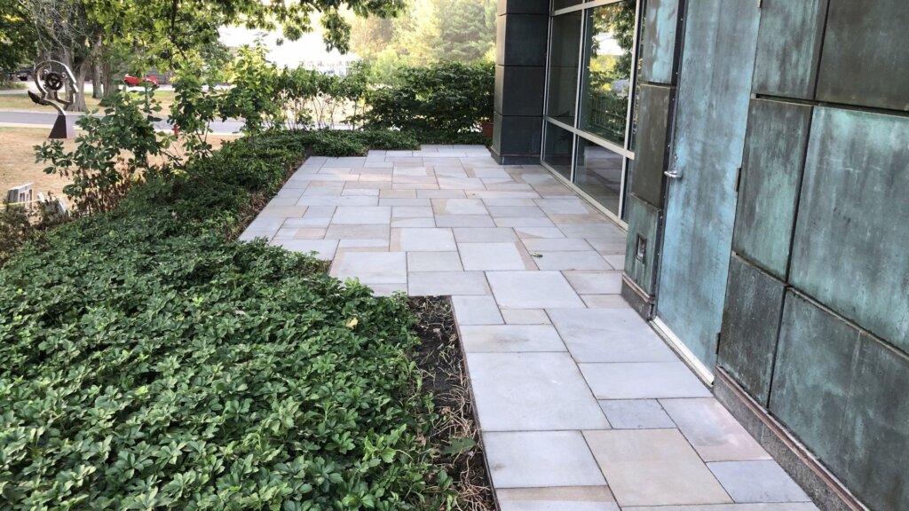 Custom stone walkway and patio masonry project in Boston, MA