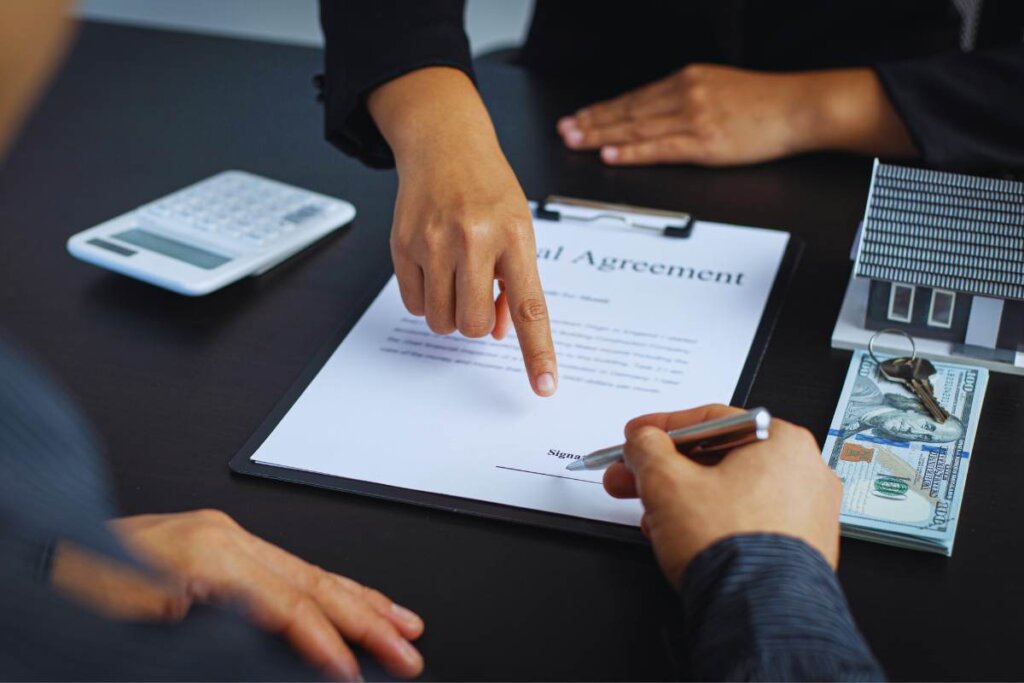 homeowner reviewing a cash offer vs listing paperwork
