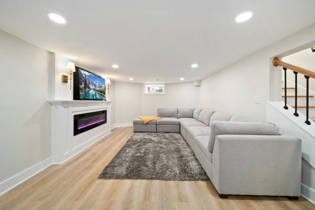 Finished basement renovation with new flooring