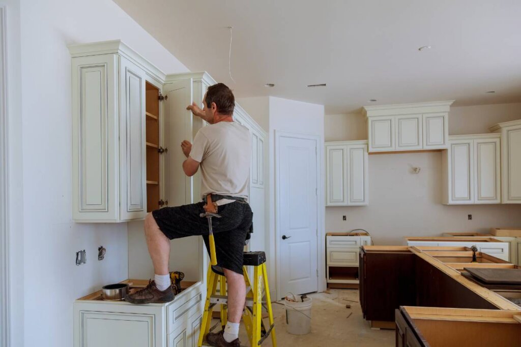 Modern updated kitchen with painted cabinets and new hardware