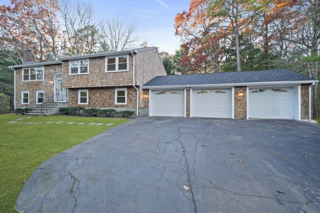 Exterior view of probate property at 203 Clark Rd after renovation 