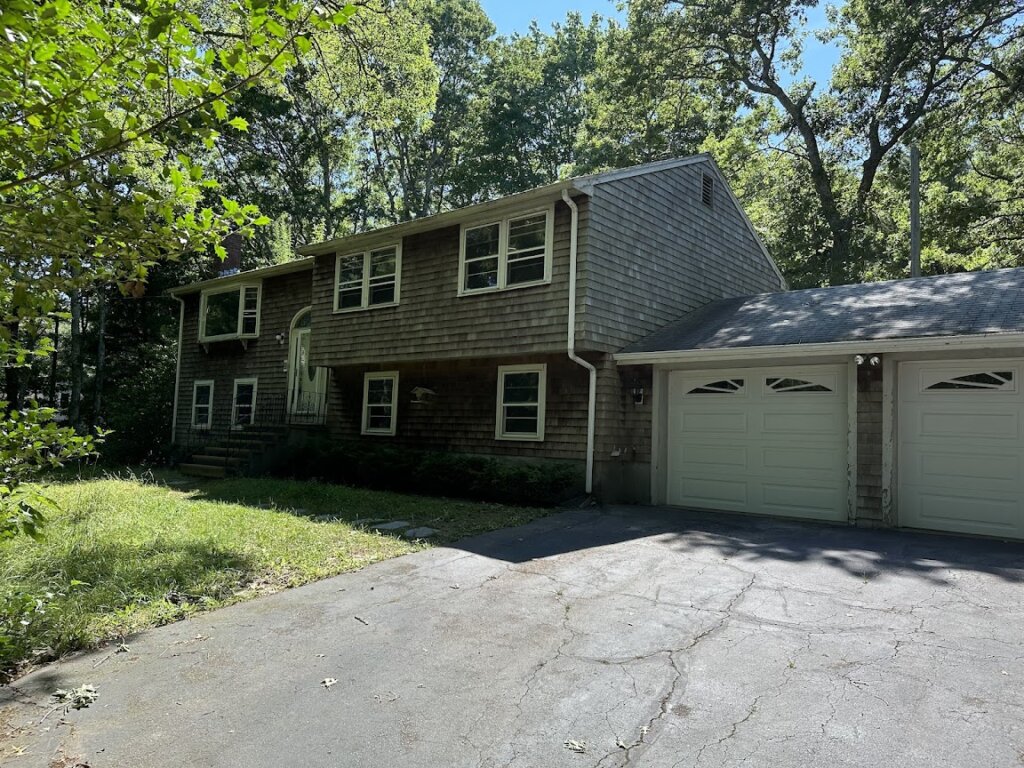 Exterior view of probate property at 203 Clark Rd purchased for cash