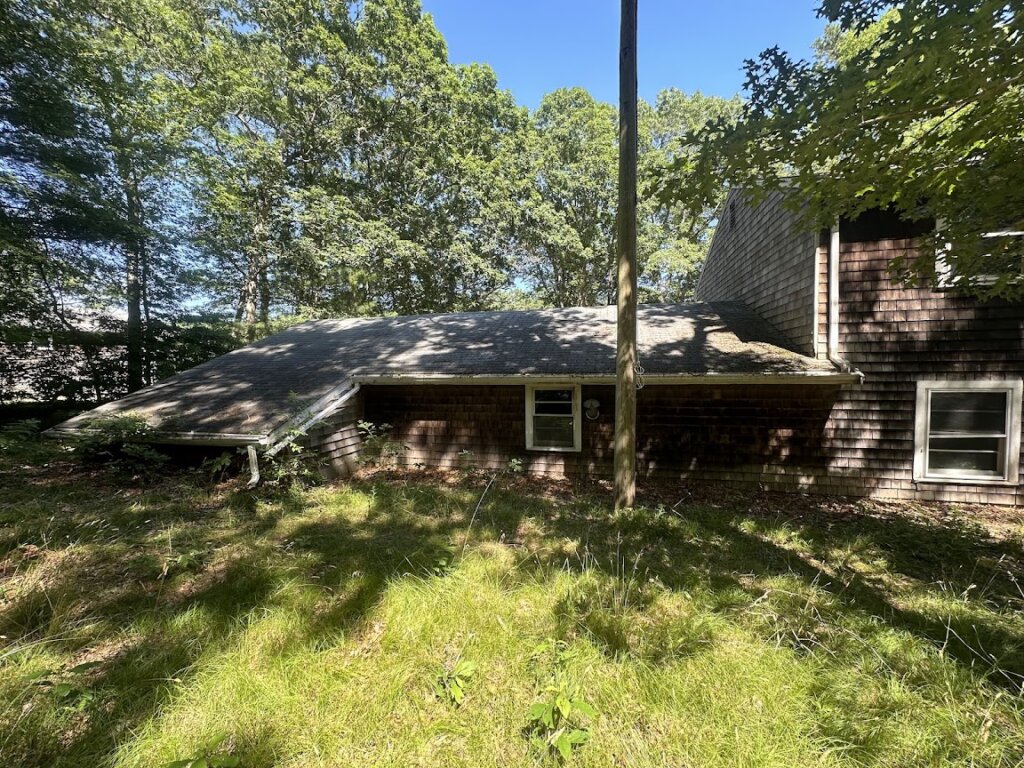 side view of probate property at 203 Clark Rd purchased for cash