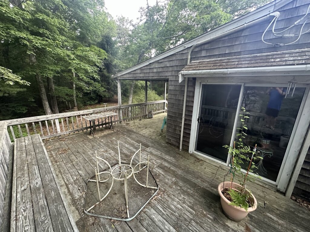 side view of probate property at 203 Clark Rd purchased for cash