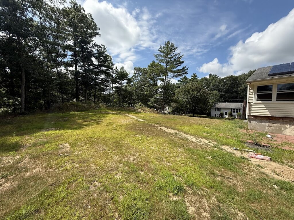 Property lot condition at 90 Esta Rd before full renovation