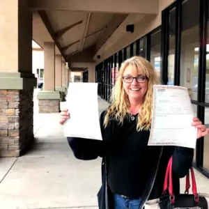 Arizona mobile home seller celebrating successful home sale.