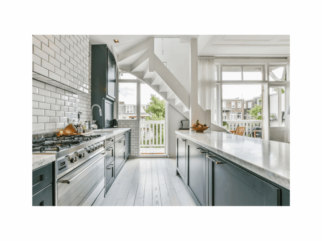 classic kitchen remodel with green cabinets and white subway tile