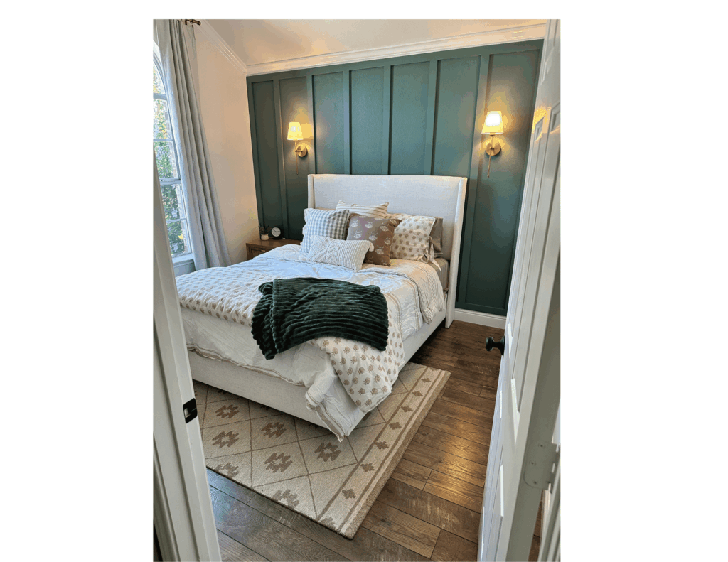 guest bedroom remodel with wall sconces, wainscoting and light white oak floors