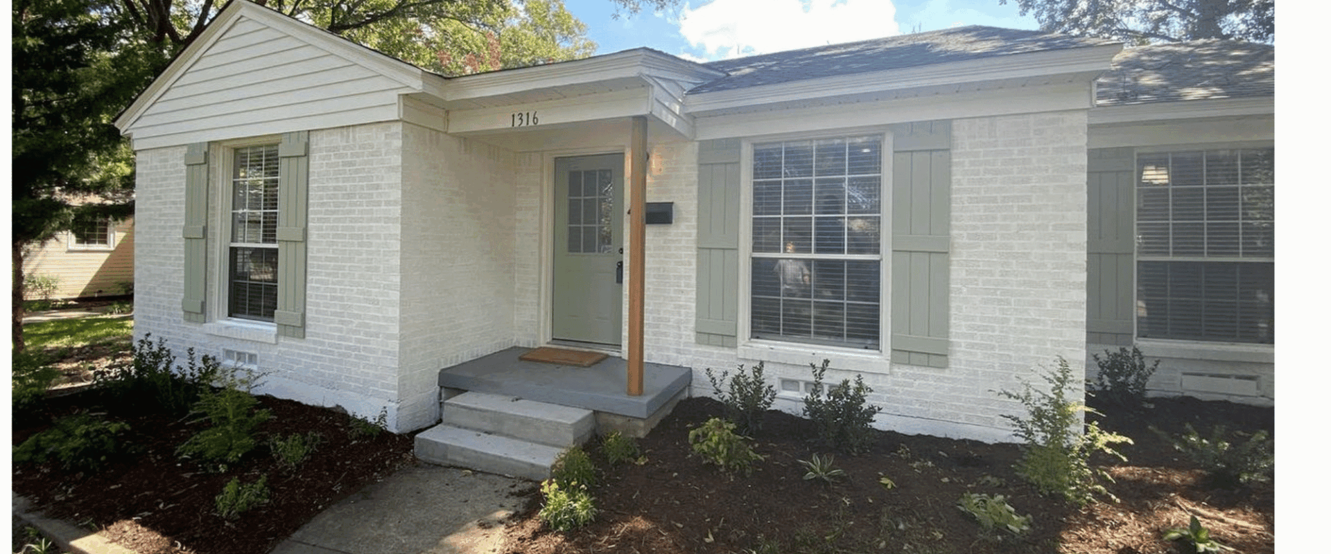 classic home remodel in garland, tx with white painted brick