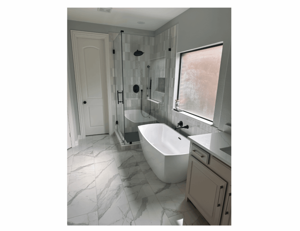 marble floors in bathroom with update frameless shower glass and free standing tub