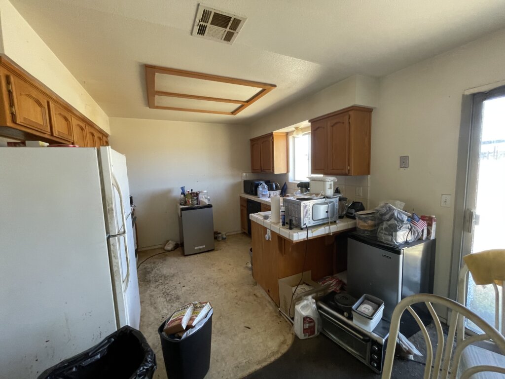 Picture of a before kitchen remodel for a inherited house we purchase as is Fresno