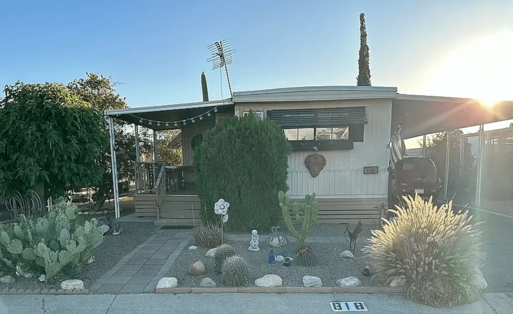 Single-wide mobile home with desert landscaping in a Tucson Arizona mobile home park
