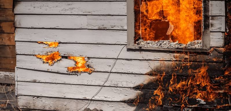 Fire-damaged house in Cincinnati with smoke damage after a residential fire