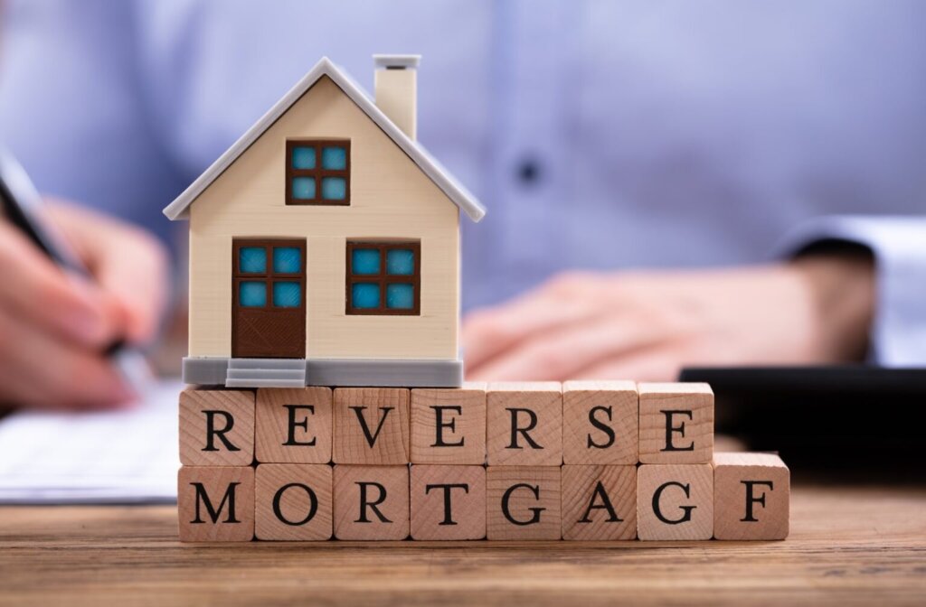 Cincinnati homeowner reviewing reverse mortgage documents before selling a house