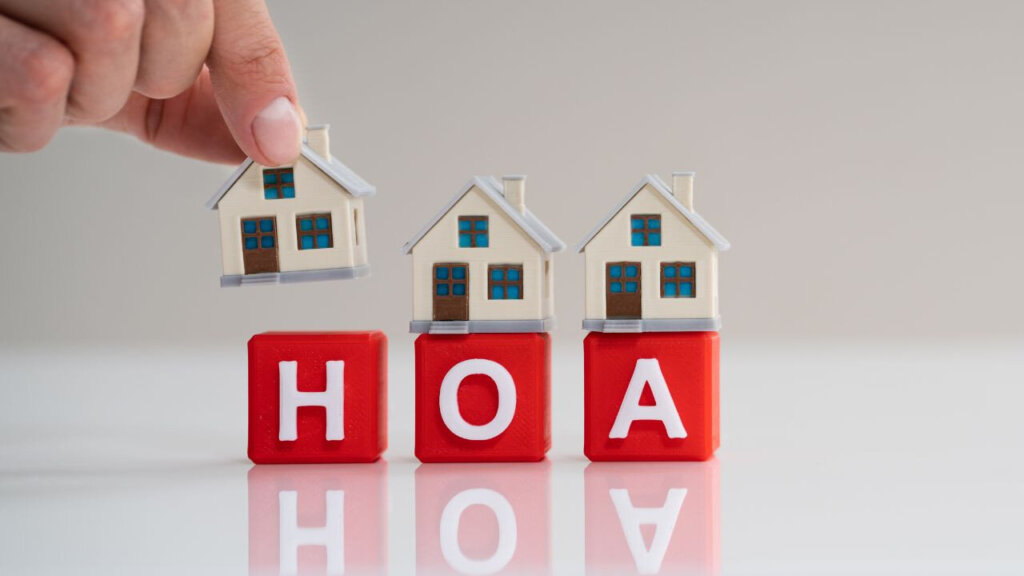 Cincinnati homeowner reviewing unpaid HOA fees before selling a house