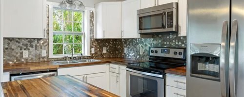 Updated kitchen with butcher block counter tops