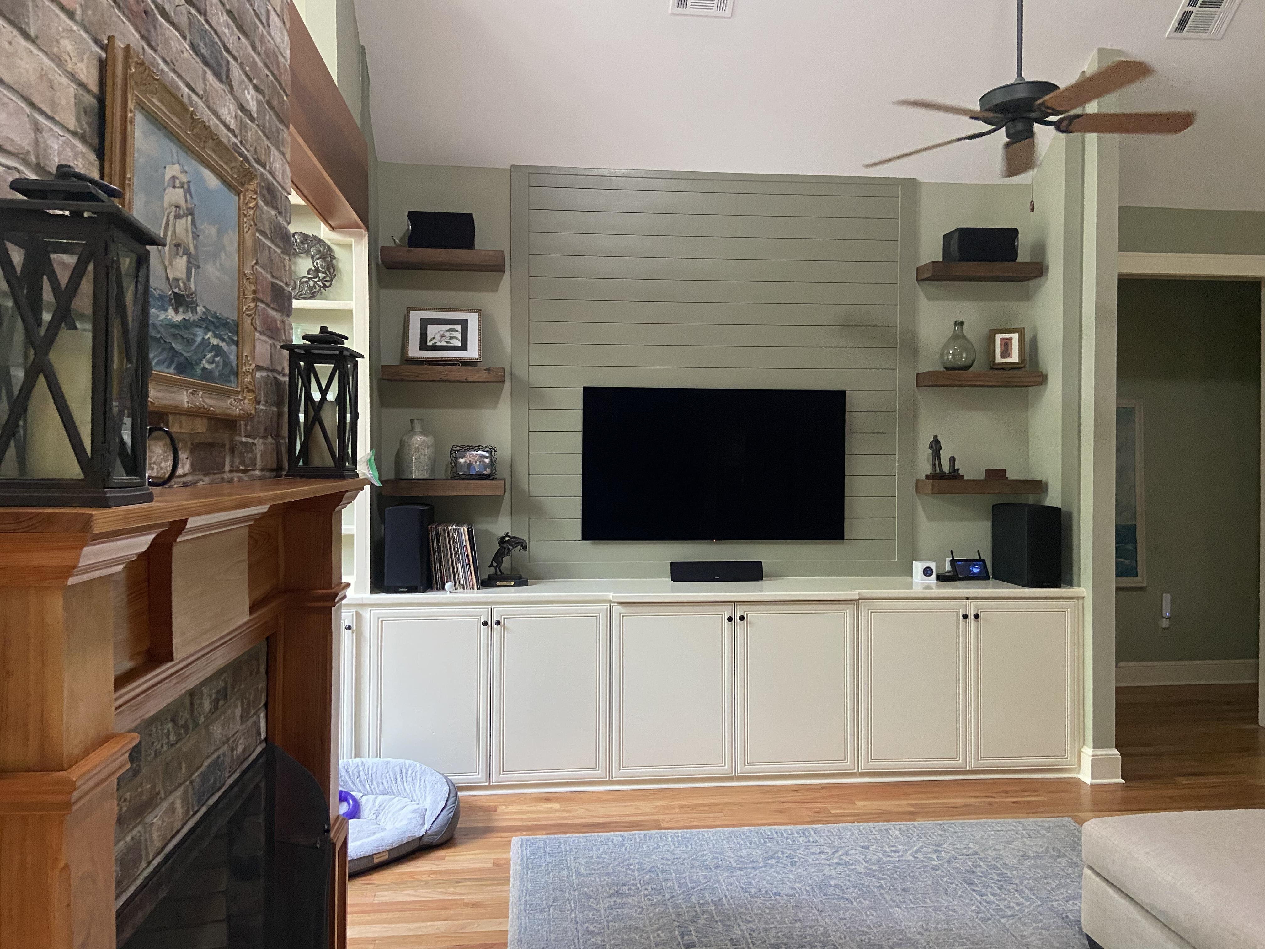 small project of updating old bookshelves into modern tv wall with shiplap and green paint