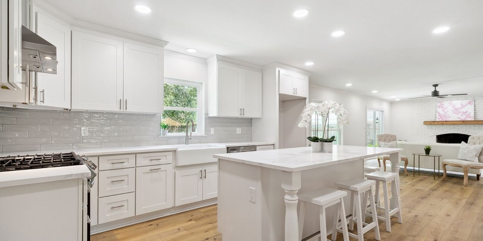 Bright open-concept kitchen and living area renovation completed for a Mandeville homeowner