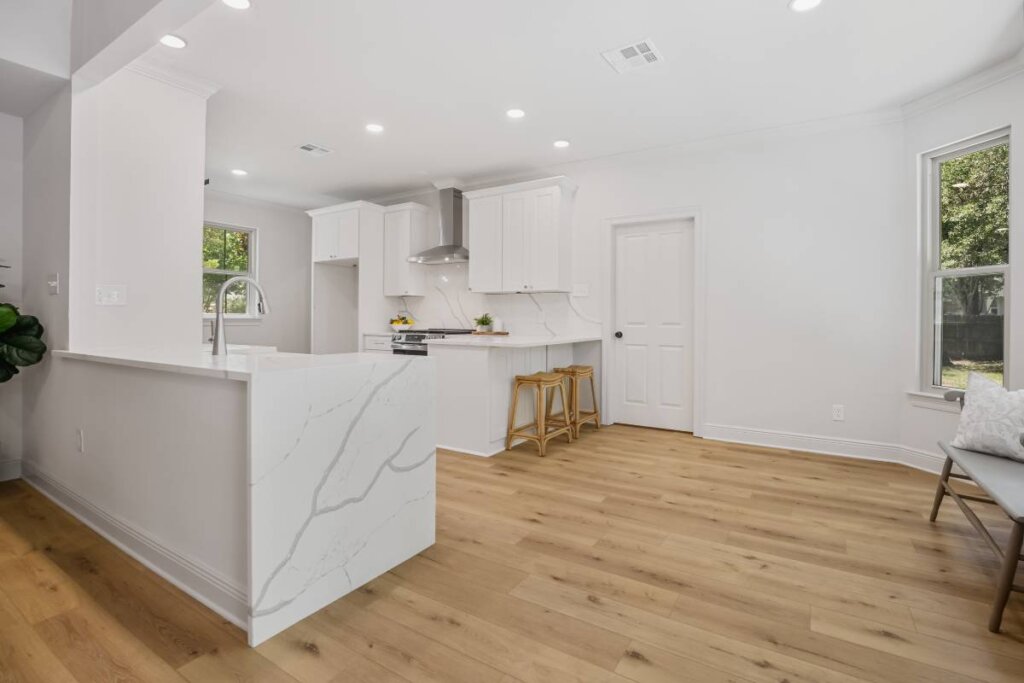 Kitchen renovation in the Fontainebleau subdivision of Mandeville with wall removal and beam installation